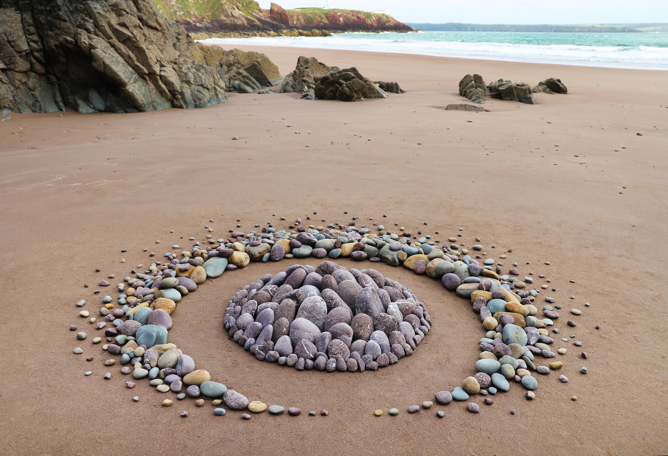 Ocean beach spiral  Earth art, Sand art, Petroglyphs art