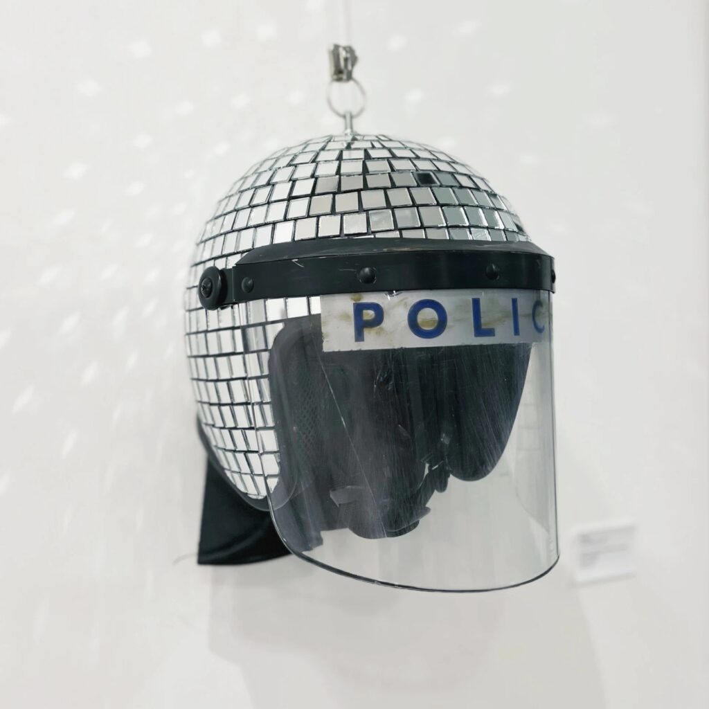 View of Calder Contemporary - Off the Wall exhibition with Banksy works - Met Helmet